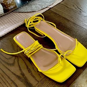 ASOS bebo yellow flat sandals.